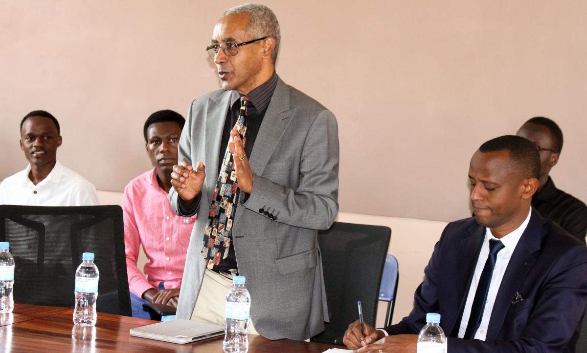 Prof. Abraham Mitike, CMHS Principal during the dissemination workshop.JPG